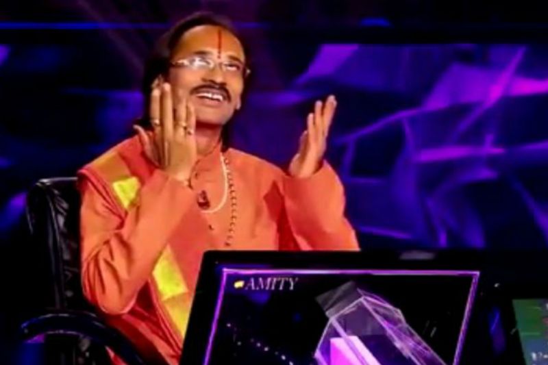 KBC11 live amitabh bachchan Astrologer 