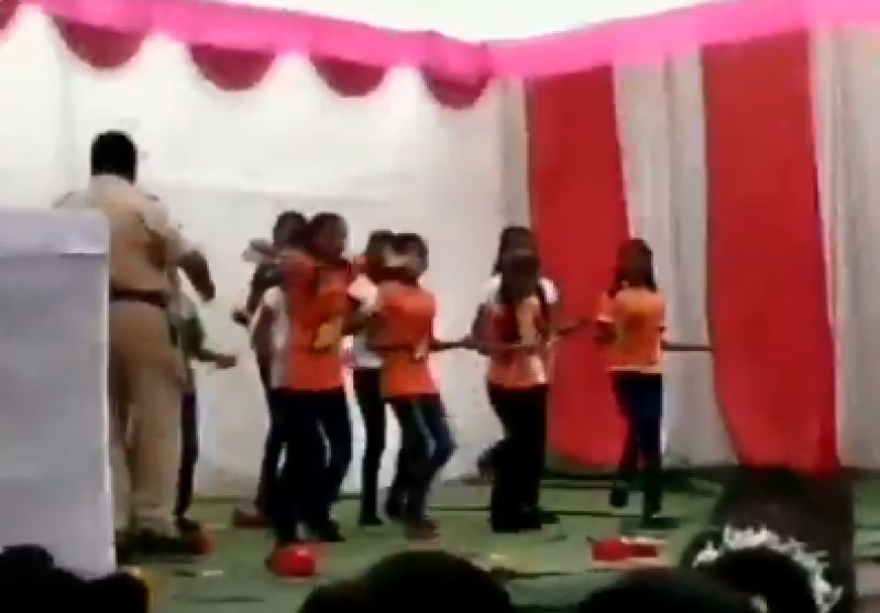 Policeman showers cash on school girls