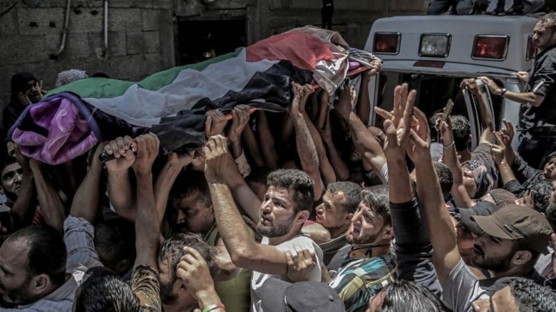 thousands attend funeral for Palestinian medic