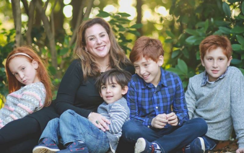 Mother having four children