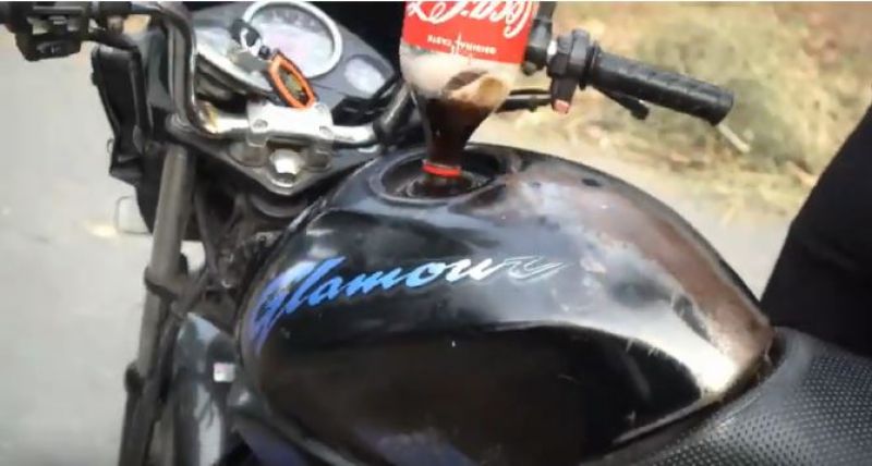 Hero honda glamours fuel tank filled with Coca Cola