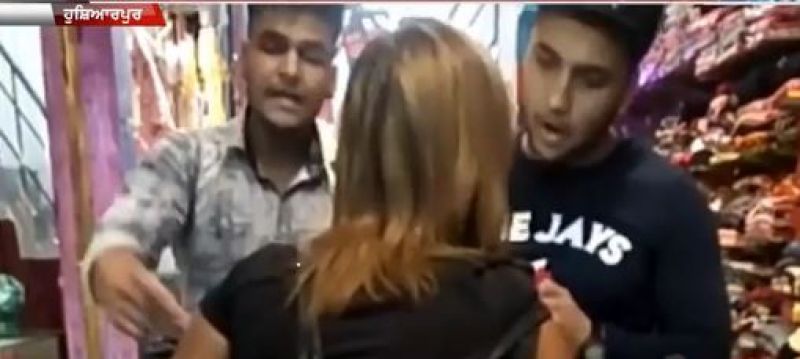 Girl argues with shopkeeper