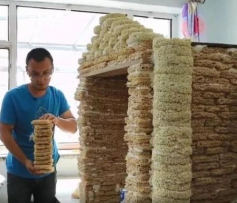 man builds childrens playhouse by instant noodle