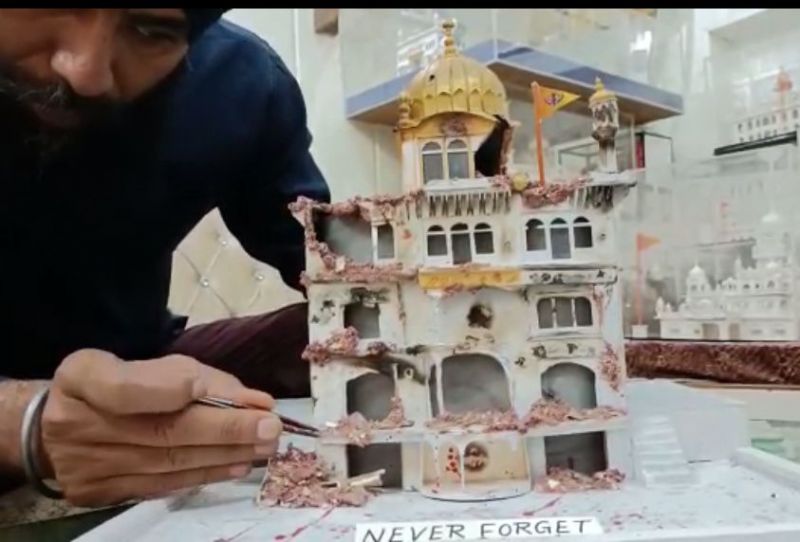 Paper Artist Gurpreet Singh builds a model of Sri Akal Takht Sahib