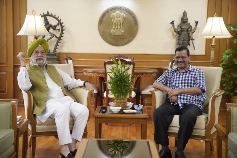 Arvind Kejriwal and Hardeep Puri