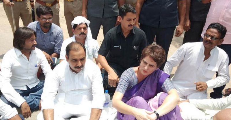 Arrested  Priyanka Gandhi continues dharna against UP authorities