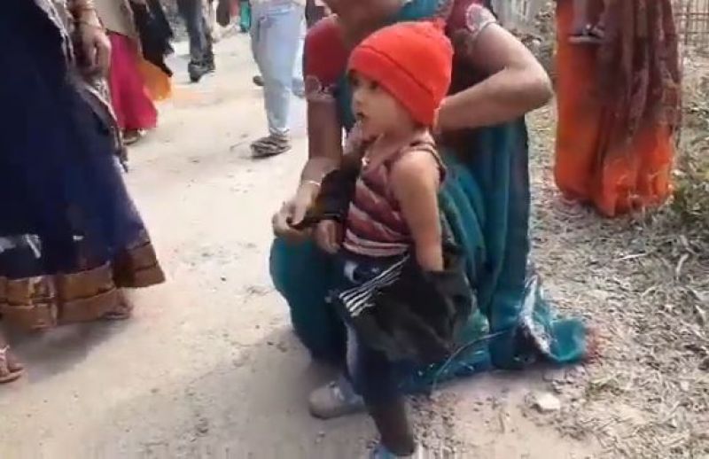 Assam police remove 3 years old child jacket 