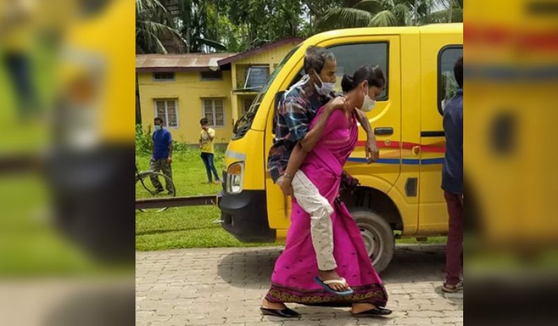 Duaghter In Law Niharika Das Carrying Covid Positive father in law on back