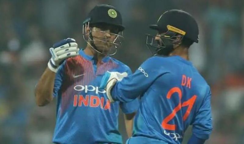 MS Dhoni and Dinesh Karthik MS Dhoni and Dinesh Karthik