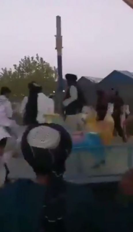 Taliban militants seen having fun in a park after capturing Kabul Taliban militants seen having fun in a park after capturing Kabul