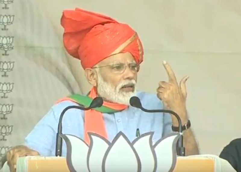 Modi addressing an election rally in Kathua