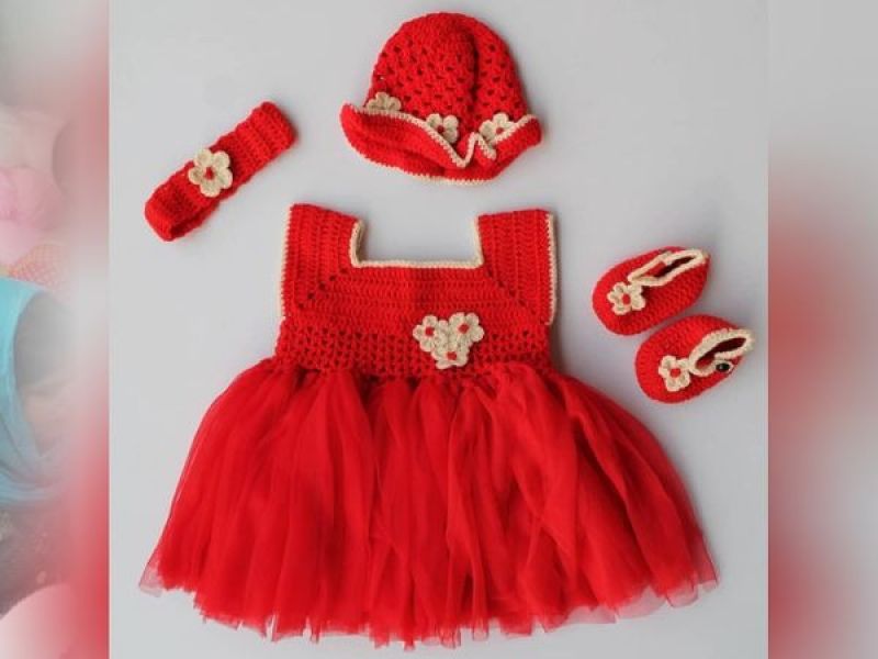 Grandma made a frock at home for her granddaughter