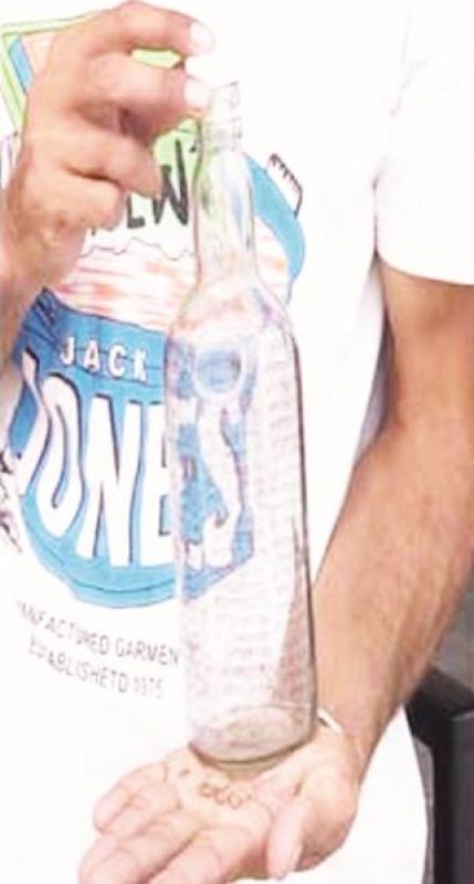 Satnaam waheguru written 150 times in a bottle