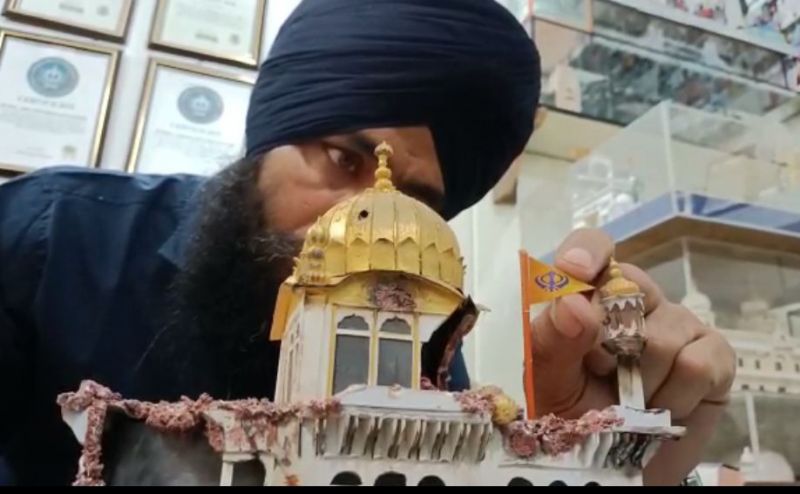 Paper Artist Gurpreet Singh builds a model of Sri Akal Takht Sahib