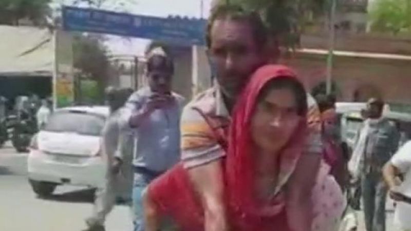 Woman carried her disable Husband on her back to CMO Office