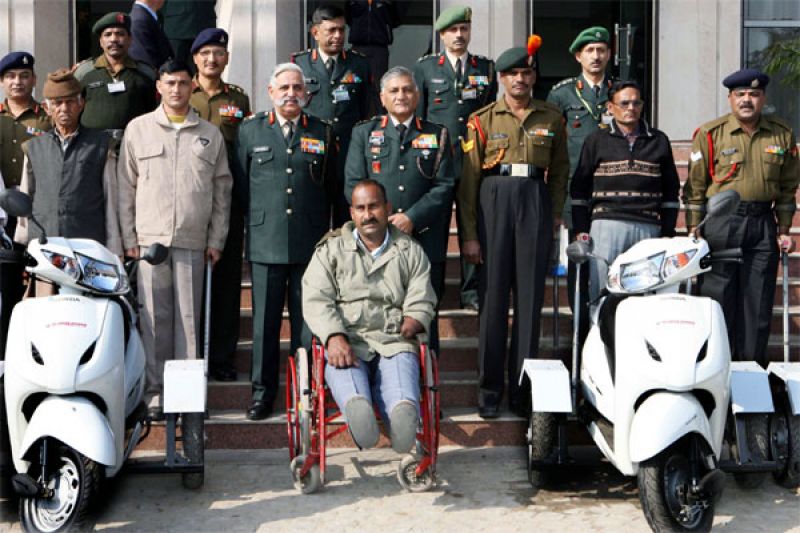 Rawat with disabled jawans