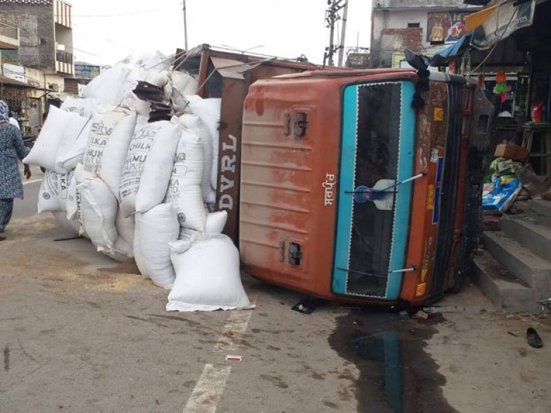 Overloaded truck hits passengers
