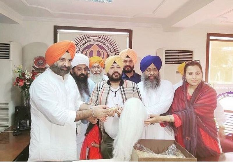Sgpc with Daler Mehndi 