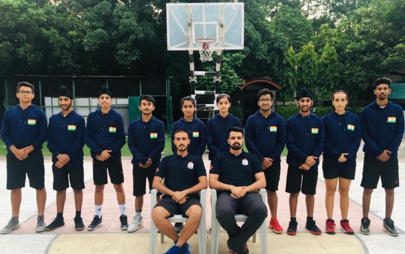 Sartaj Sandhu with basketball students