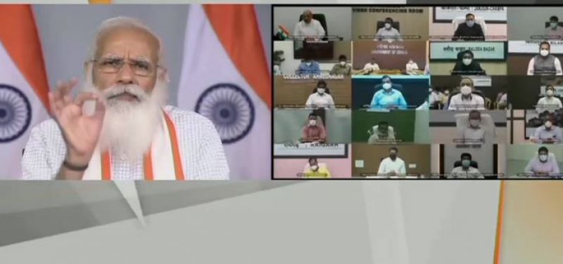 Narendra Modi interacts with district officials on Covid19 situation Narendra Modi interacts with district officials on Covid19 situation