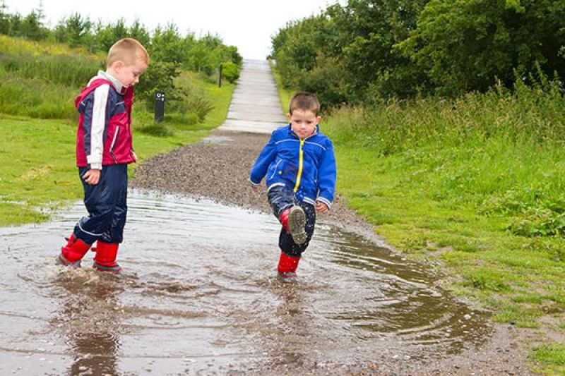 Kids playing in rain
