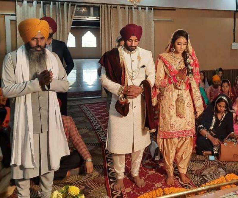 Indian Hockey captain Manpreet Singh marries Illi Siddique in Jalandhar Indian Hockey captain Manpreet Singh marries Illi Siddique in Jalandhar