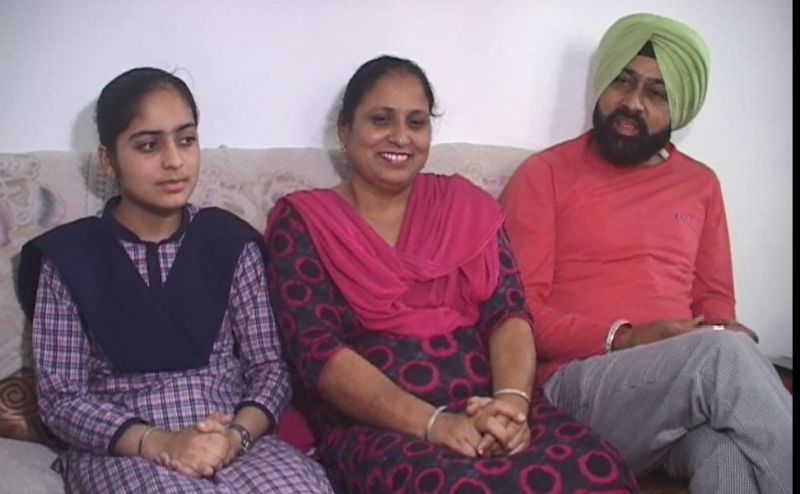 Damanpreet with her parents