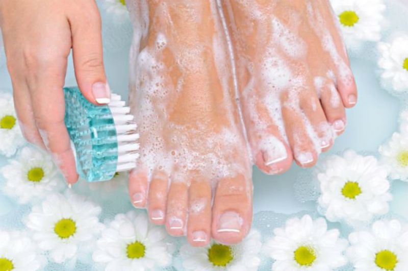 clean foot with soap