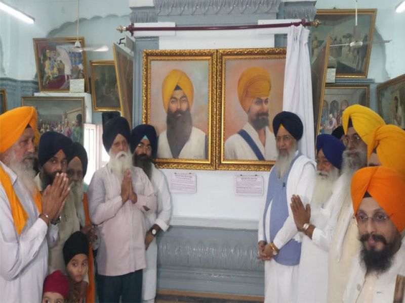 Portraits of Shaheed Bhai Mahinga Singh and Bhai Avtar Singh adorned in Central Sikh Museum