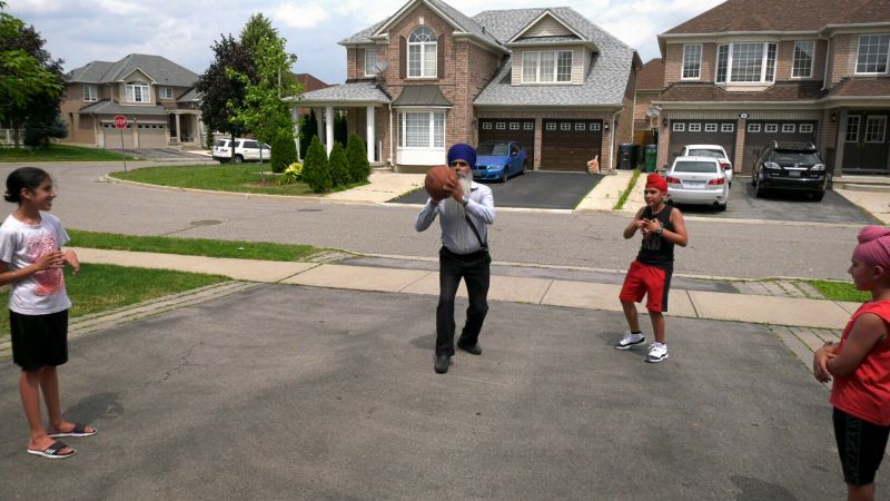 10 year old child and his grandfather playing basketball, video viral