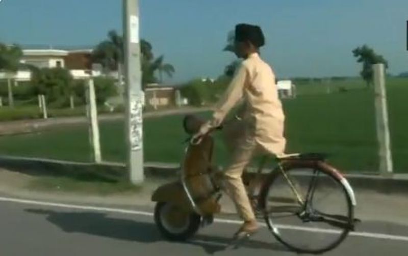 Father and Son made a bicycle that looks like scooter