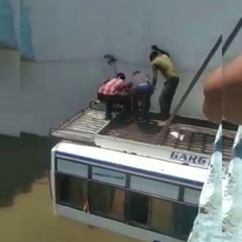 Bus full of passengers sinks in 10 feet deep water