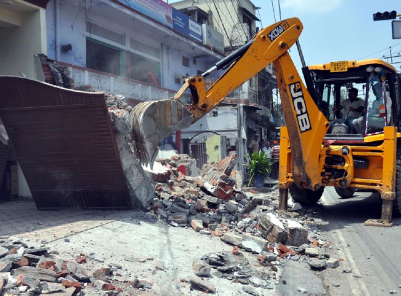 Unlawful possession of JCB removal in Dehradun