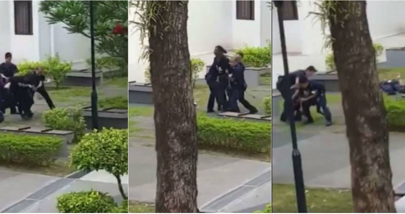 Drunk Indian attacks cop in Singapore Drunk Indian attacks cop in Singapore