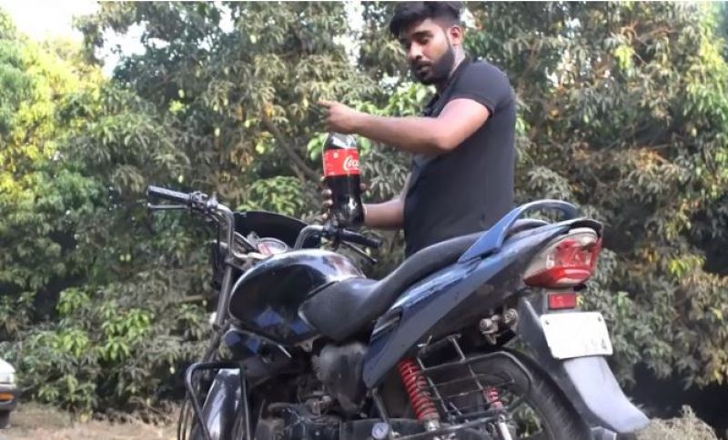 Hero honda glamours fuel tank filled with Coca Cola