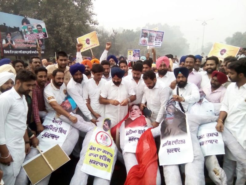 Shiromani Akali Dal members stage a protest rally demanding justice for the families of those killed in the 1984 anti-Sikh riots