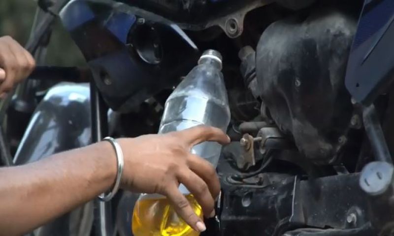 Hero honda glamours fuel tank filled with Coca Cola