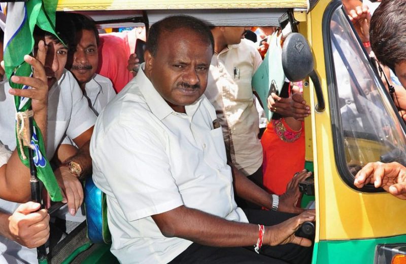 befor karnataka election result jds leader kumarswami goes to singapore