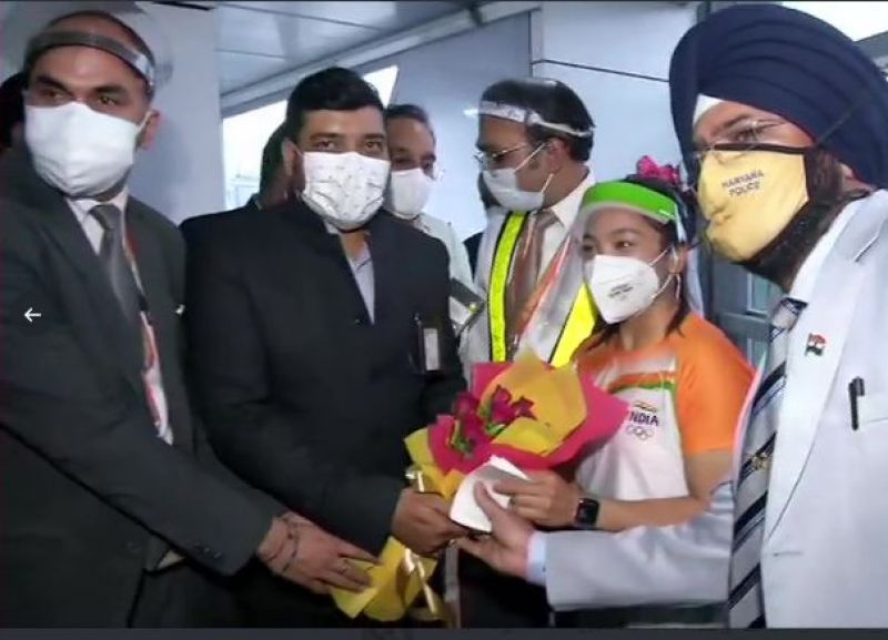 Olympic silver medalist Mirabai Chanu arrives at the airport from Tokyo Olympic silver medalist Mirabai Chanu arrives at the airport from Tokyo
