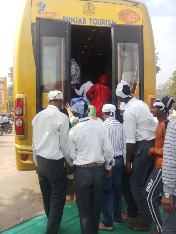 Special exhibition bus of tourism department educating pilgrims through photo, videos