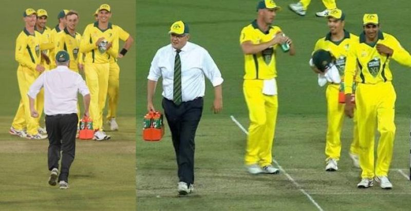 Australia PM Scott Morrison turns water boy during match