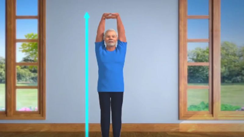 after trikonasana pm modi tweets second yoga lesson on tadasana