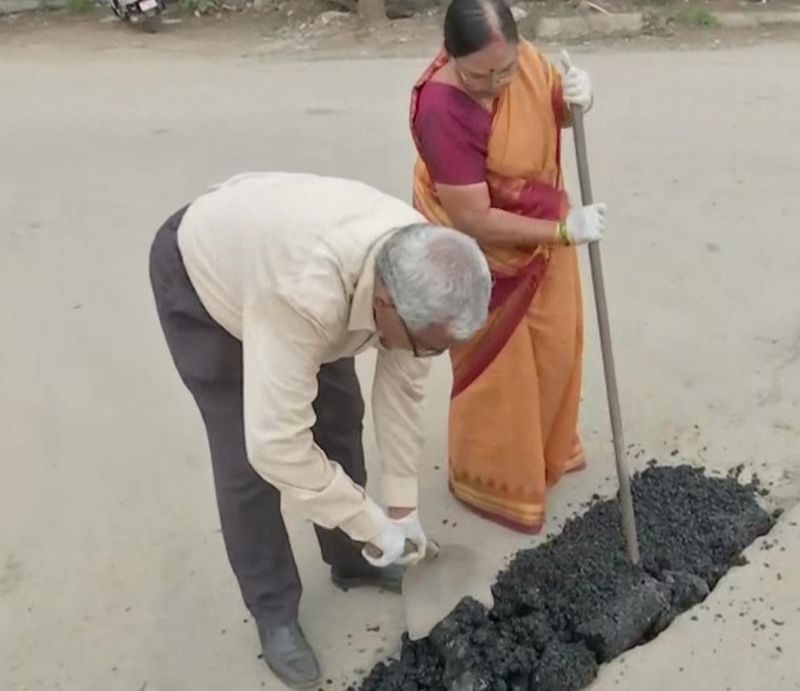  Old Couple in Hyderabad Spends Pension Money to Repair Potholes