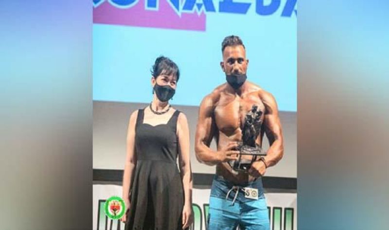 Proud thing: Punjab youth waving flags in bodybuilding competition in Italy