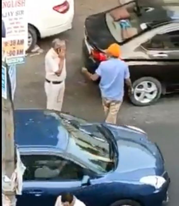  Sikh auto driver and his son were brutally thrashed by Delhi Police